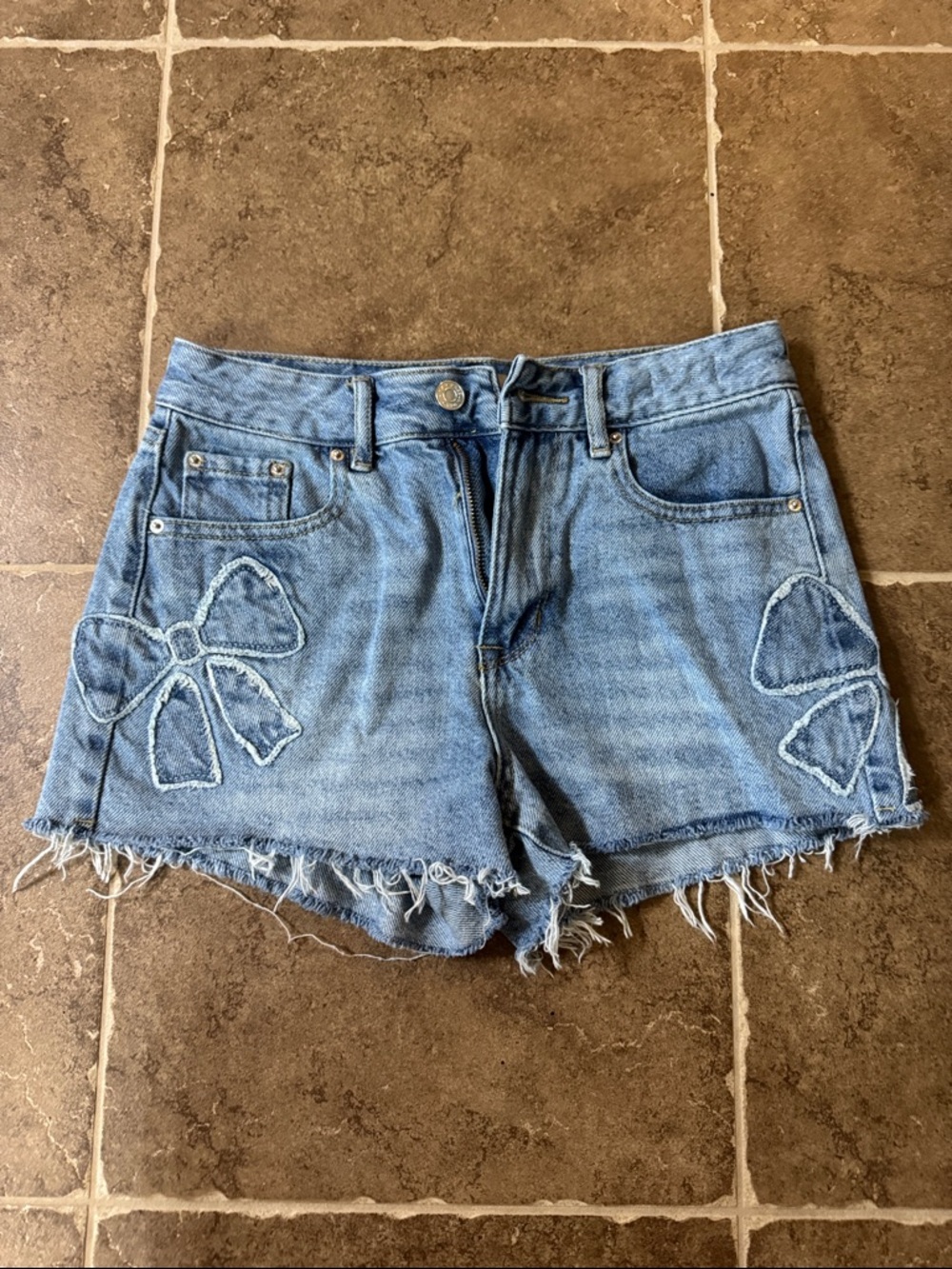 PacSun Light Blue Denim Cutoff Shorts with Bow Appliqués
